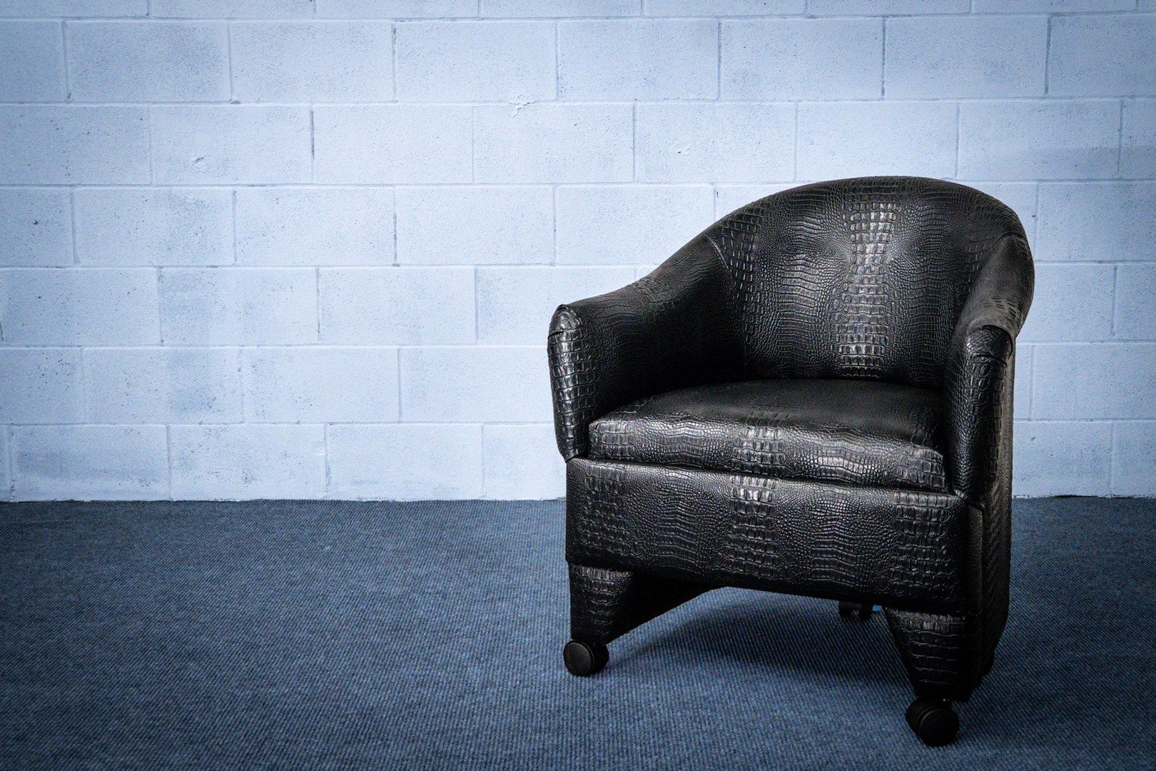 Black crocodile barrel chair